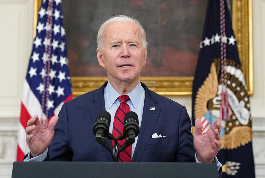 US President Joe Biden speaks about the Colorado shootings in the State Dining Room of the White House in Washington, DC, on March 23, 2021. - A 21-year-old man was charged Tuesday with gunning 10 people down in a Colorado grocery store, as America reeled from its second mass shooting in less than a week -- sparking urgent new calls for gun control. The suspect, named as Ahmad Al Aliwi Alissa, was in hospital after being shot in an exchange of fire with officers following the attack on King Soopers Supermarket in Boulder County, 30 miles (50kms) northwest of the state capital Denver, on March 22. (Photo by MANDEL NGAN / AFP) (Photo by MANDEL NGAN/AFP via Getty Images)