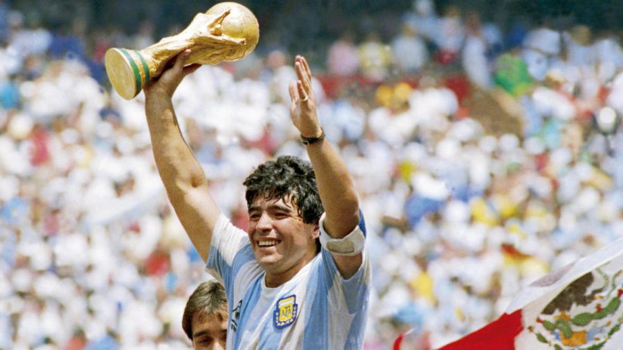 MEXICO CITY, MEXICO - JUNE 29: Diego Maradona of Argentina holds the World Cup trophy after defeating West Germany 3-2 during the 1986 FIFA World Cup Final match at the Azteca Stadium on June 29, 1986 in Mexico City, Mexico. (Photo by Archivo El Grafico/Getty Images)