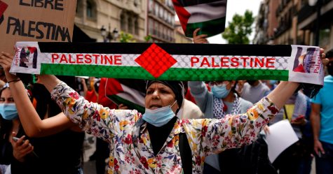 A woman participates in a protest in support of Palestinians amid their ongoing conflict with Israel, in Madrid, Spain May 15, 2021. REUTERS/Juan Medina