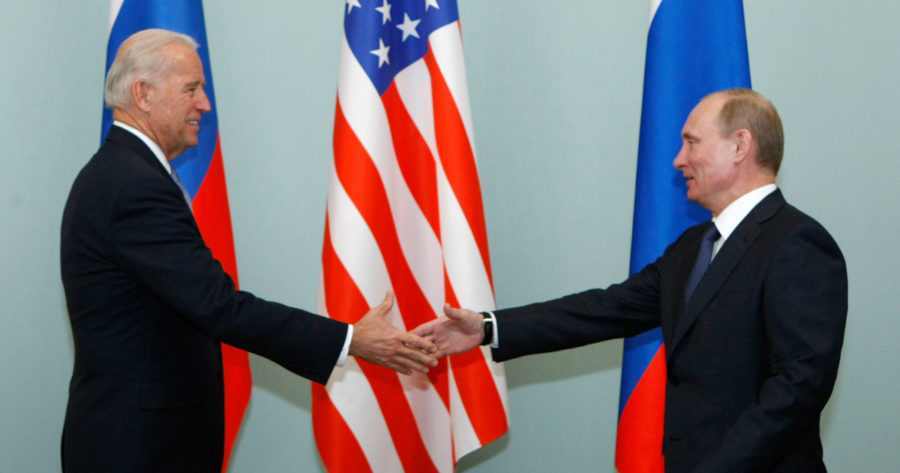 FILE - In this March 10, 2011, file photo, Vice President of the United States Joe Biden, left, shakes hands with Russian Prime Minister Vladimir Putin in Moscow, Russia. Putin won’t congratulate President-elect Joe Biden until legal challenges to the U.S. election are resolved and the result is official, the Kremlin announced Monday, Nov. 9, 2020. (AP Photo/Alexander Zemlianichenko, File)